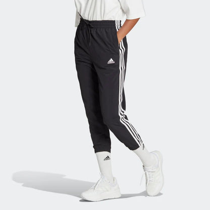 ADIDAS ESSENTIALS 3-STRIPES WOVEN 7/8 TRACKSUIT BOTTOMS